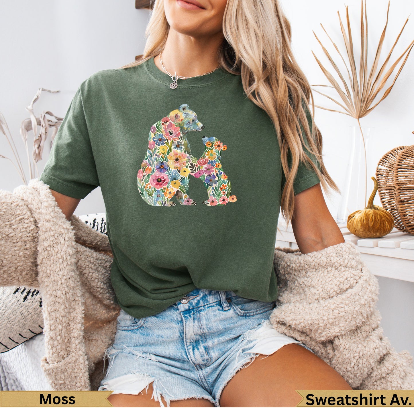 Green t-shirt with bear and cub floral design.
