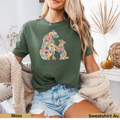 Green t-shirt with bear and cub floral design.