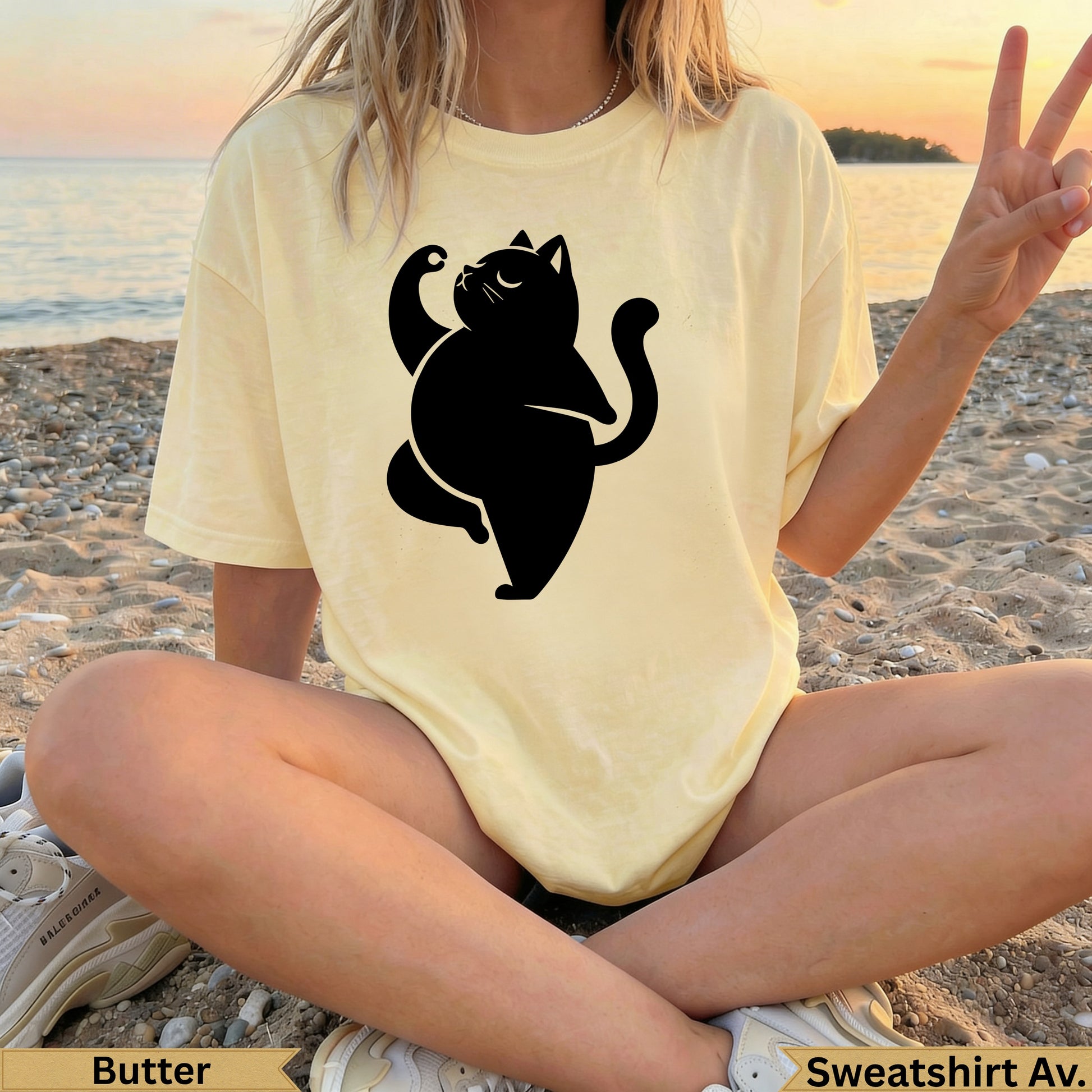 Light yellow t-shirt with black cat graphic and "Butter" text.