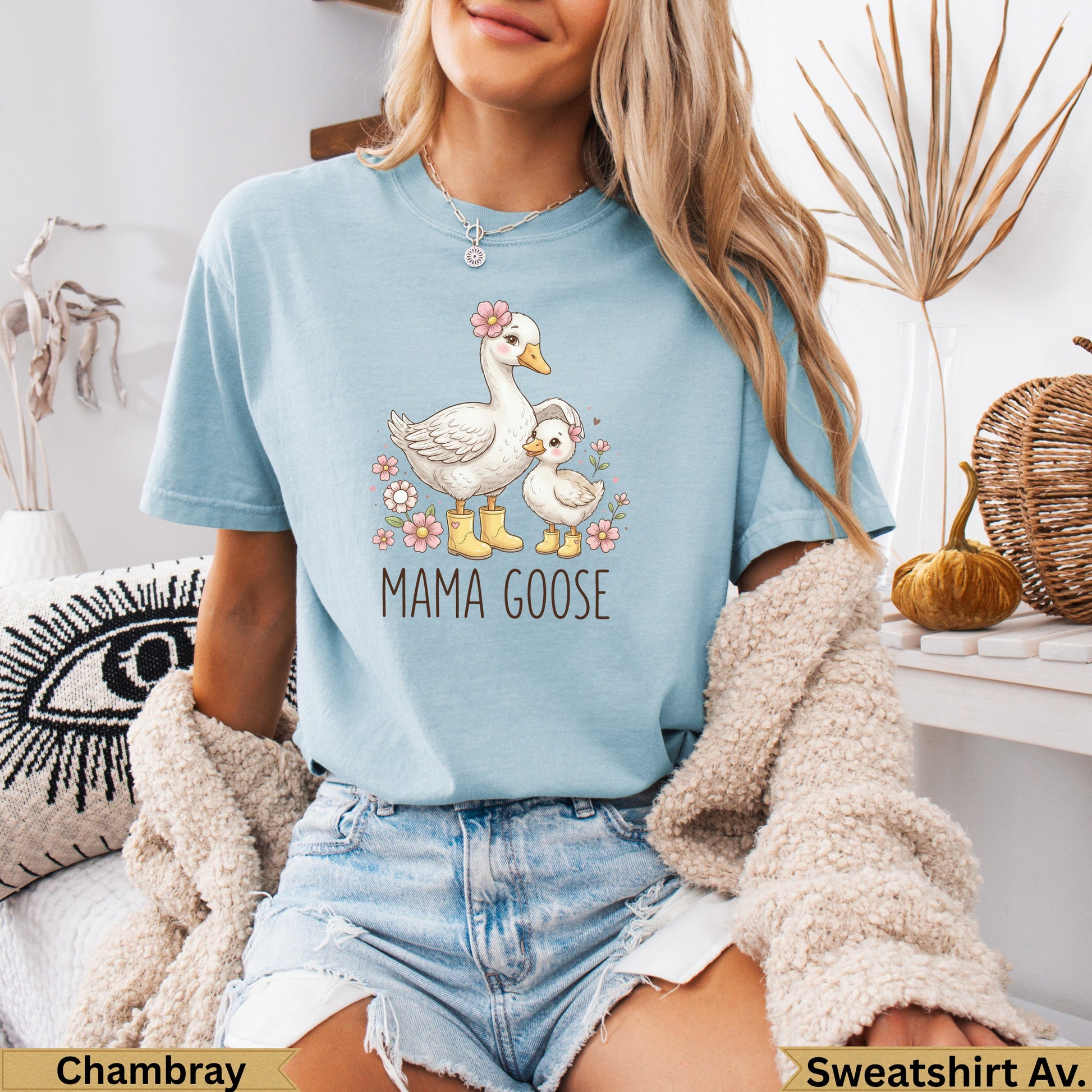Light blue t-shirt with "Mama Goose" text and cartoon geese graphic.