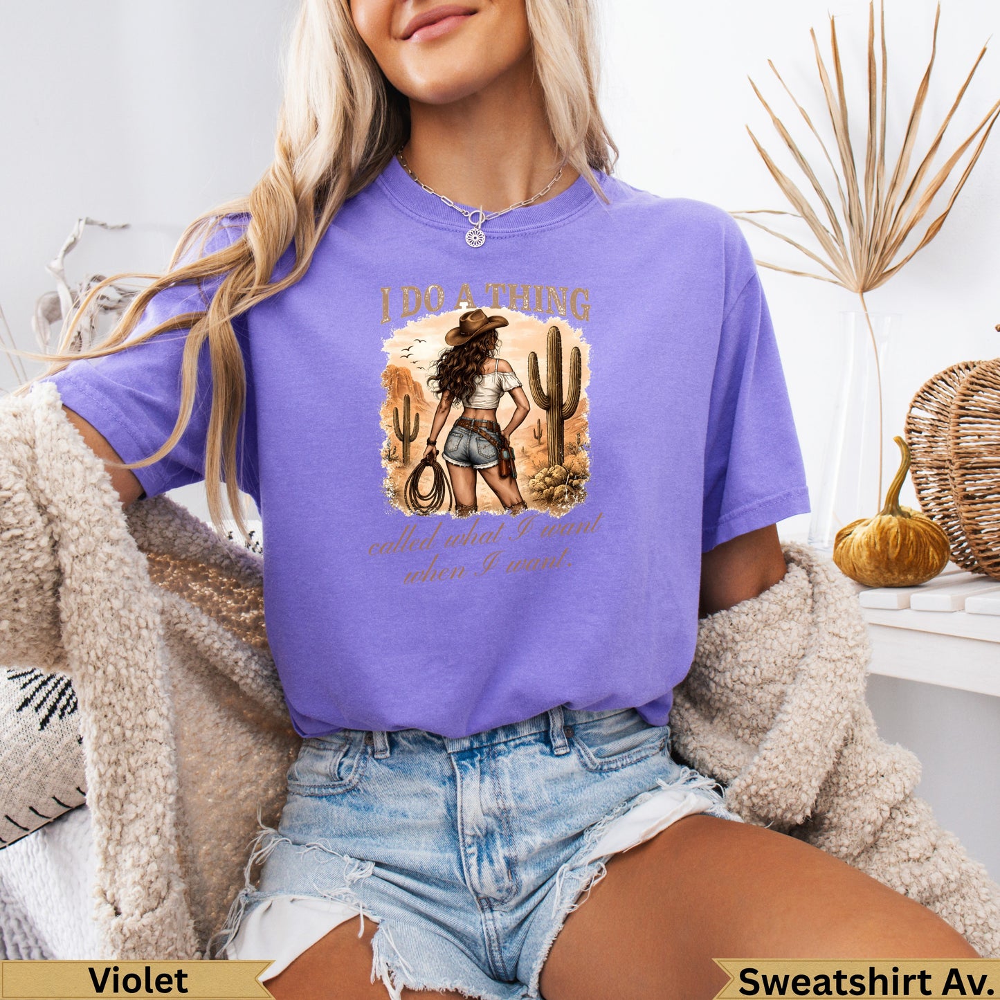 Purple t-shirt with "I do a thing called when I want" text and cowboy graphic.