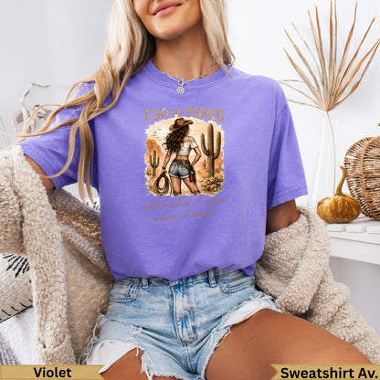 Purple t-shirt with "I do a thing called when I want" text and cowboy graphic.