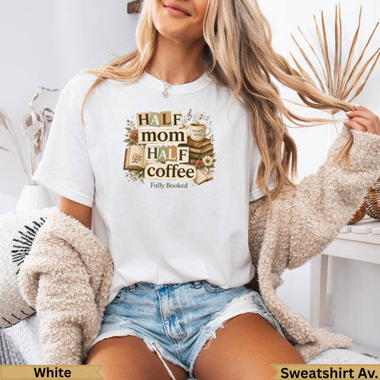 White t-shirt with "Mom Half Coffee" graphic and open books.
