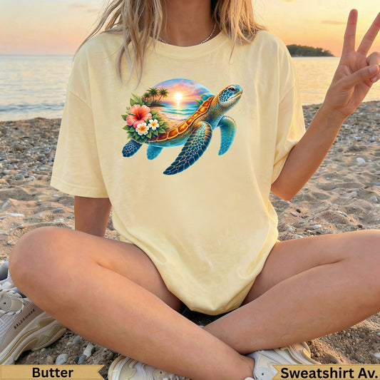 Yellow t-shirt with a colorful sea turtle, palm trees, and flowers design.