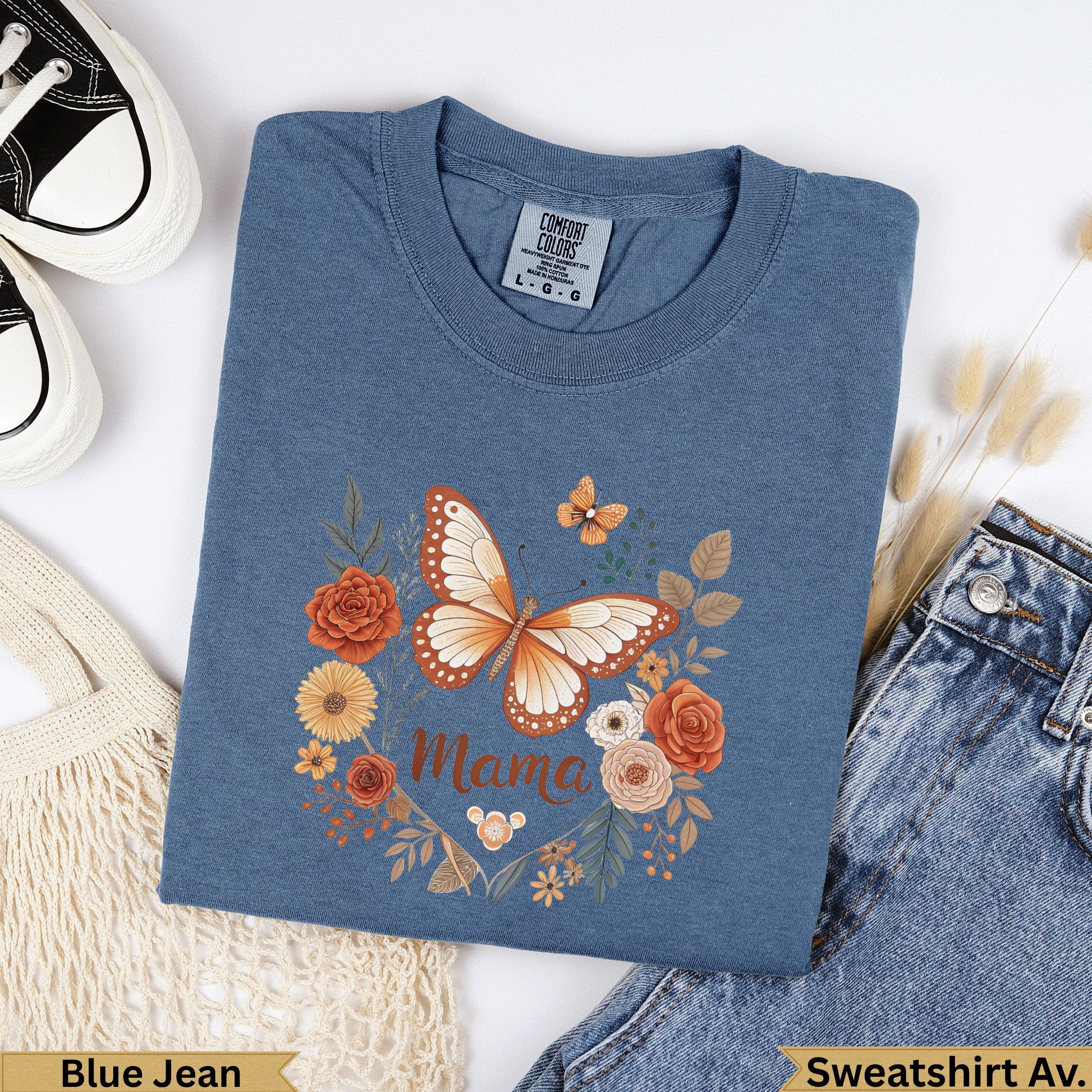 Blue sweatshirt with a butterfly and floral design, reading "Mama".