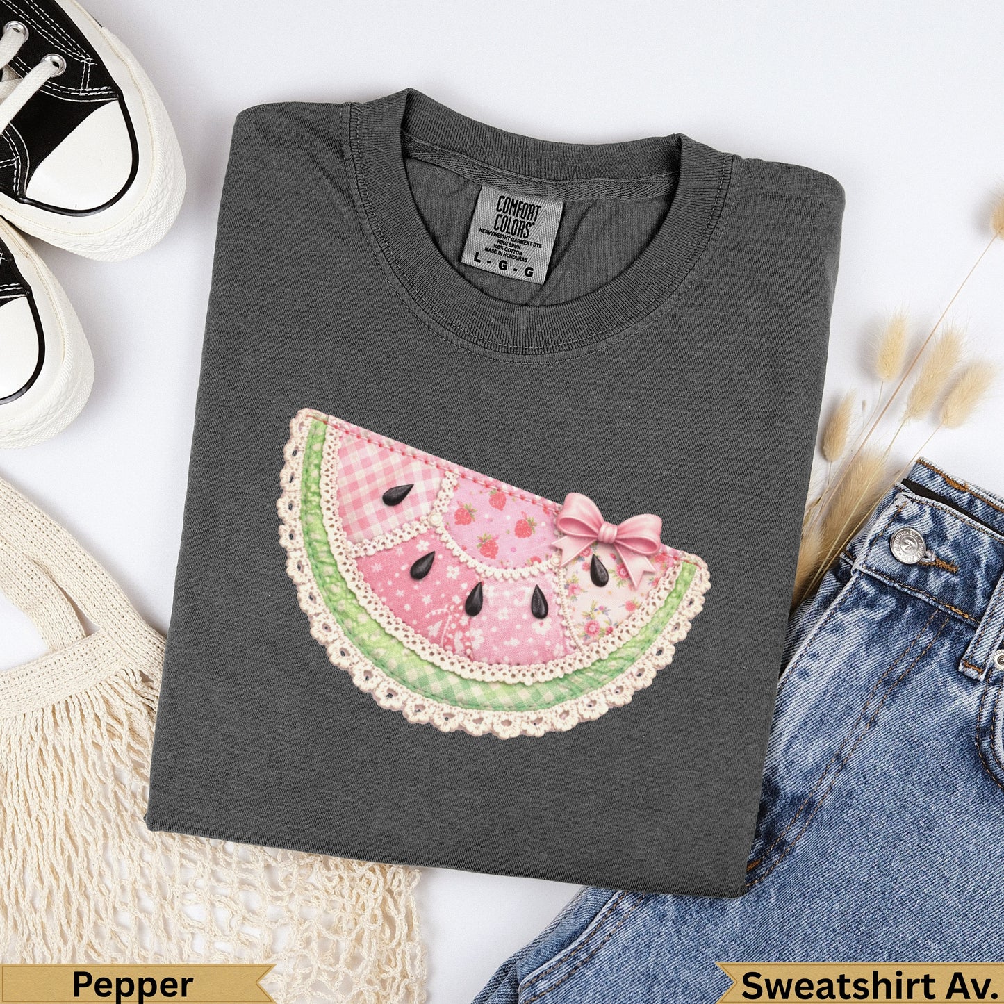 Dark gray sweatshirt with a pink watermelon slice graphic and text "Pepper".