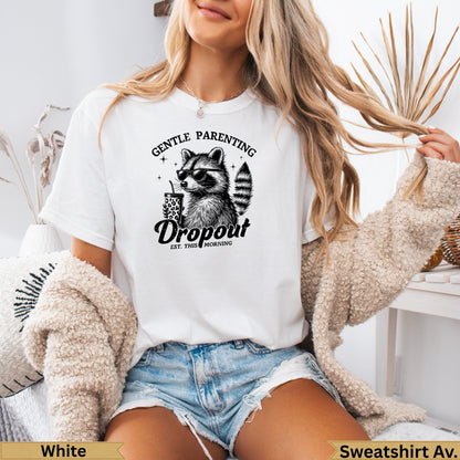 White t-shirt with raccoon drinking coffee, text "Gentle Parenting Dropout".