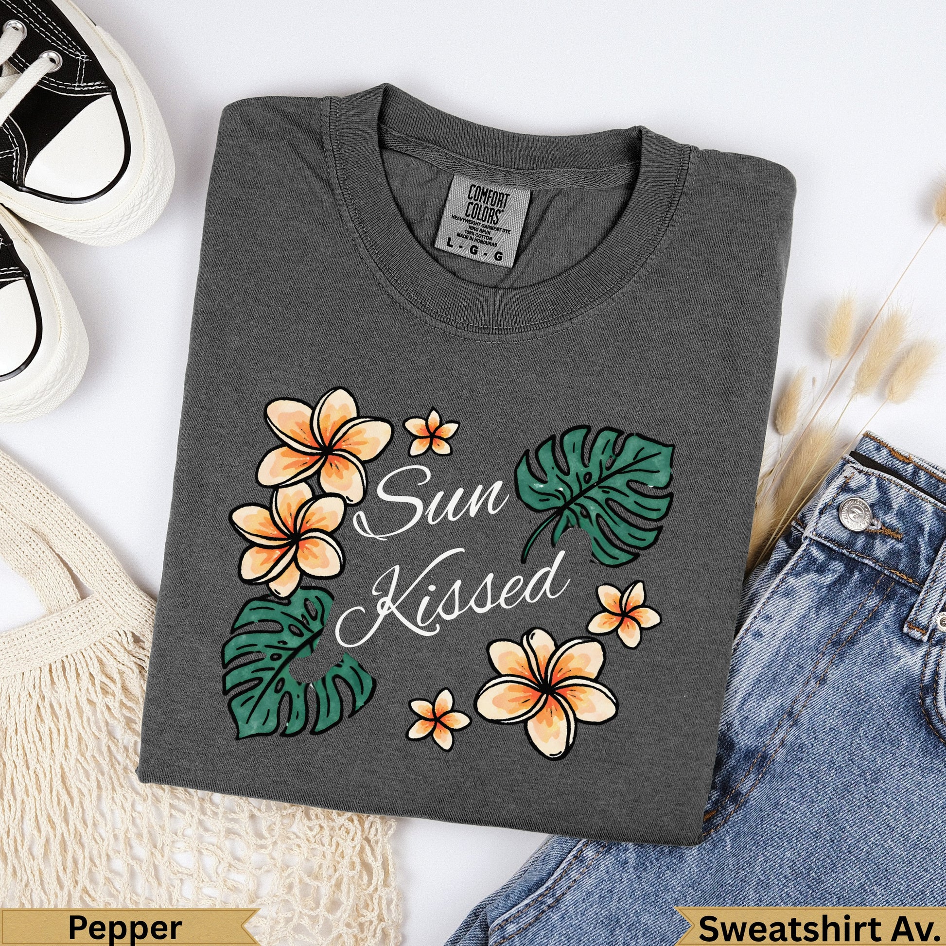 Comfort Colors Pepper sweatshirt with "Sun Kissed" floral graphic.