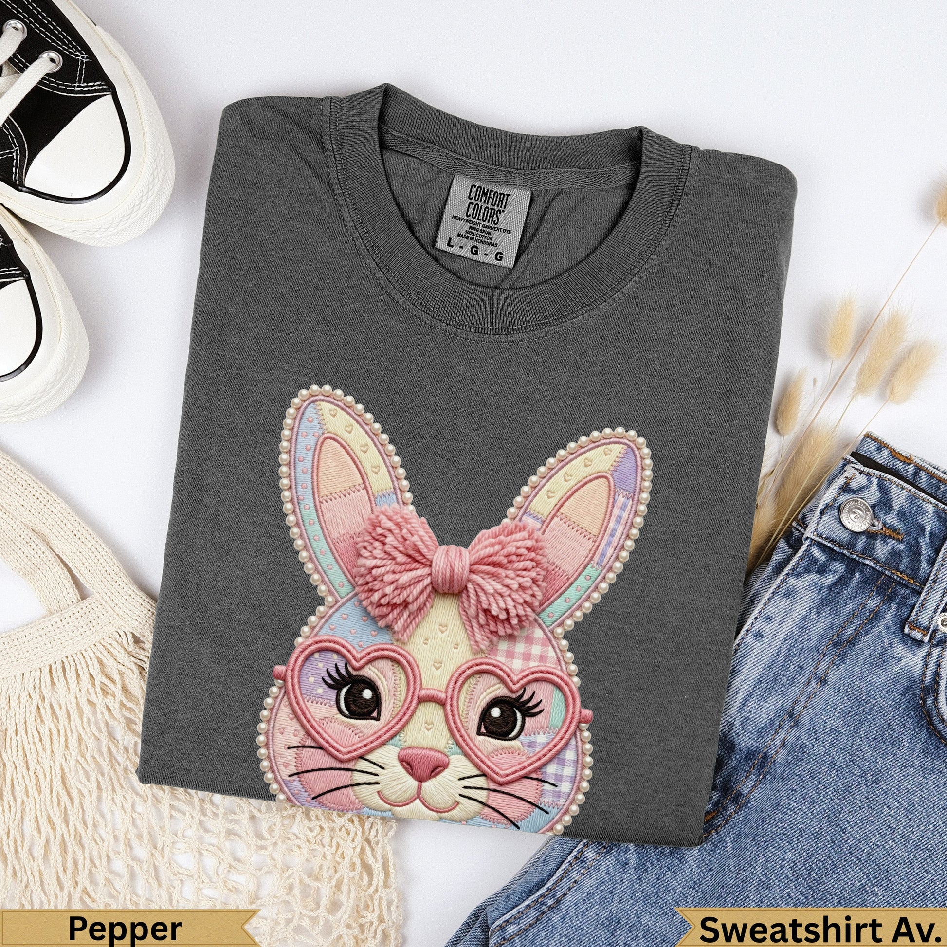 Dark grey Comfort Colors sweatshirt with embroidered bunny wearing heart glasses.
