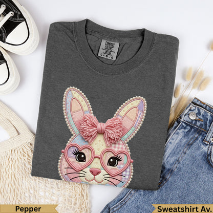 Dark grey Comfort Colors sweatshirt with embroidered bunny wearing heart glasses.