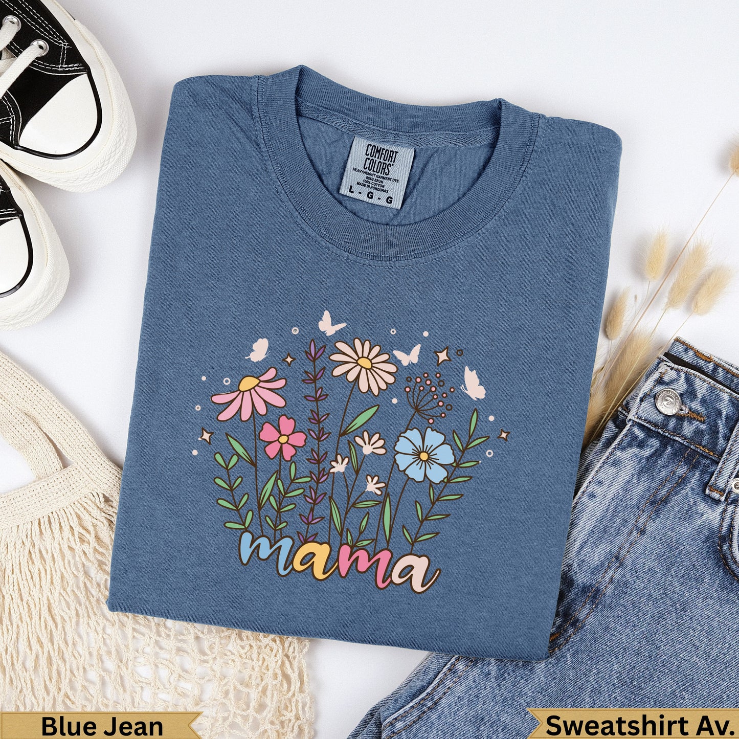 Blue Jean Comfort Colors sweatshirt with "mama" and floral graphic.