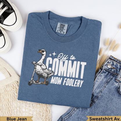 Blue Jean Comfort Colors sweatshirt with a goose on a scooter saying "Off to commit mom foolery".
