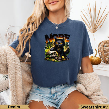 Black cat with gold coins, skull, and flames on a navy t-shirt.
