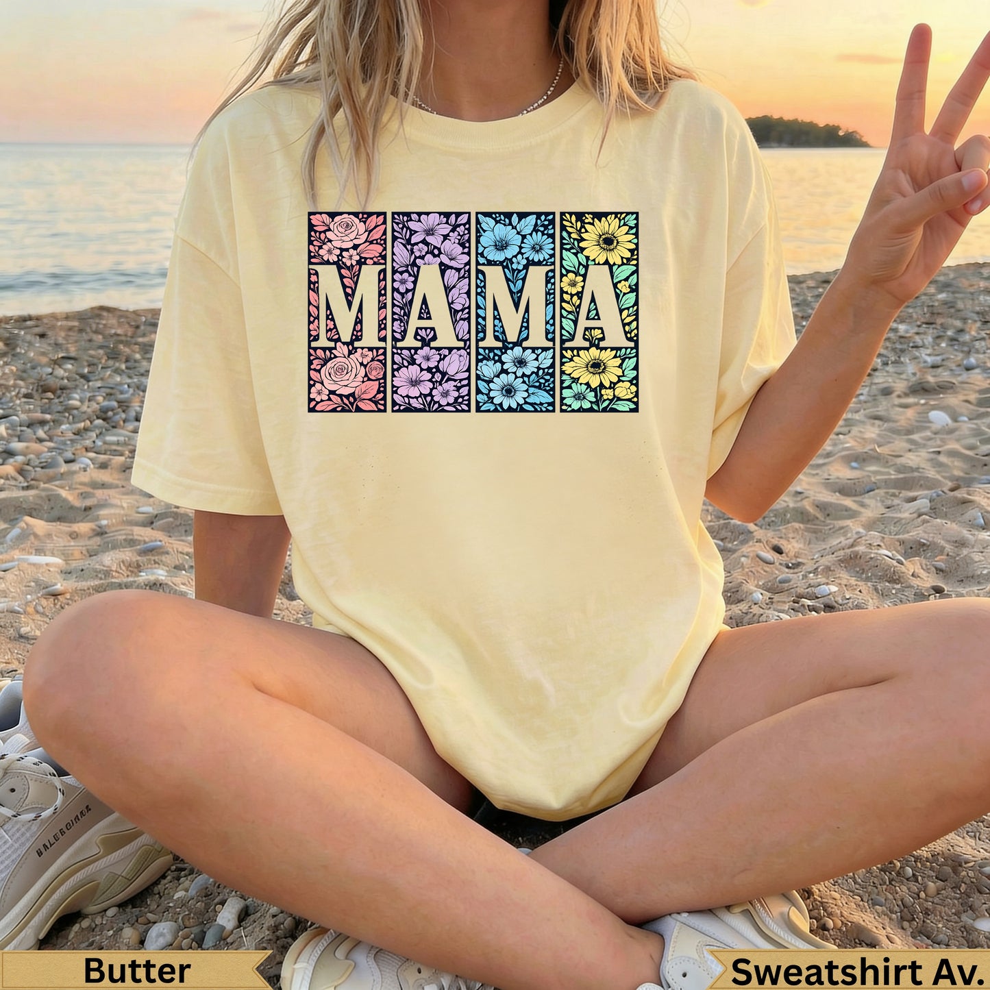Yellow t-shirt with pastel floral squares spelling "MAMA" across the chest.