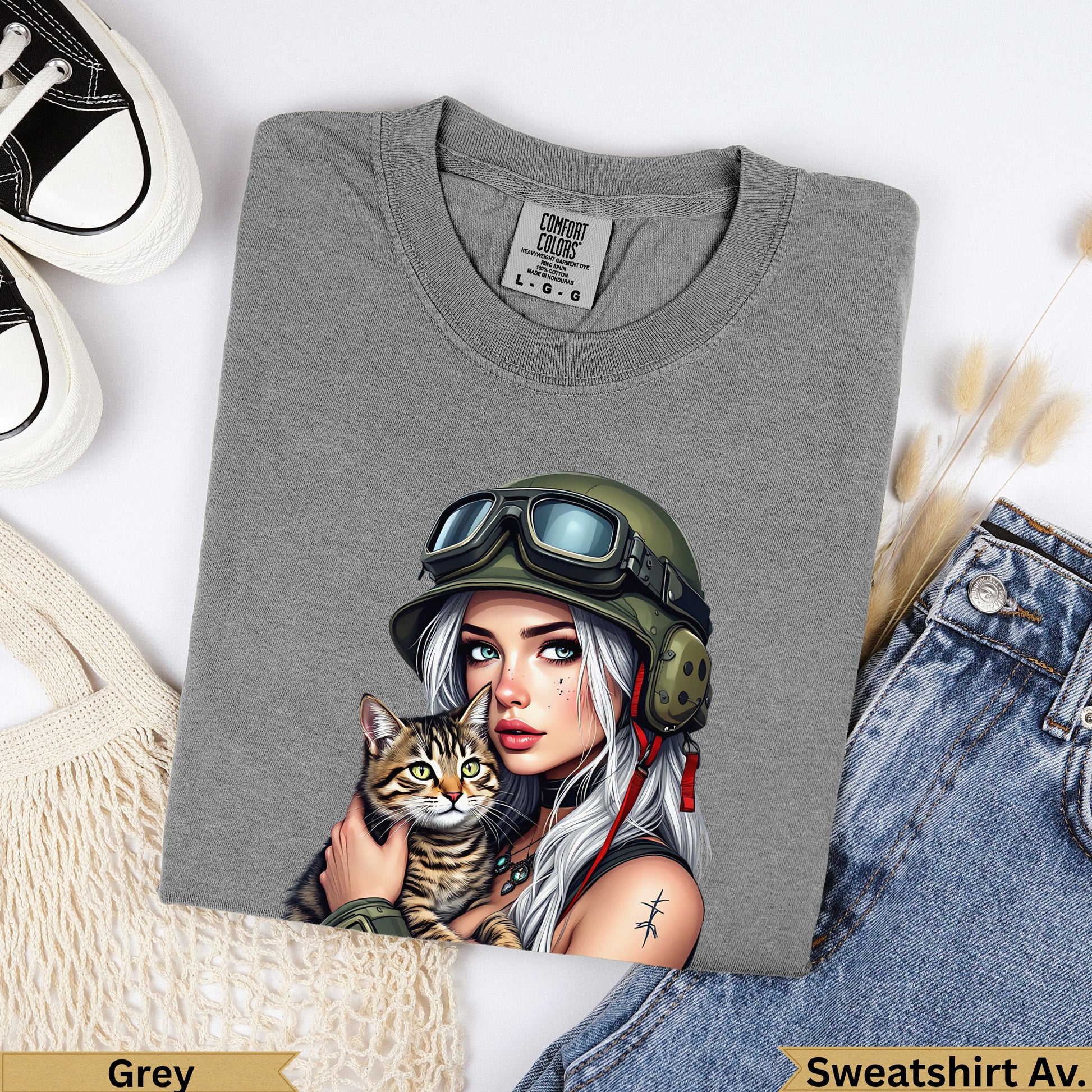 Grey Comfort Colors sweatshirt with military girl holding cat graphic.