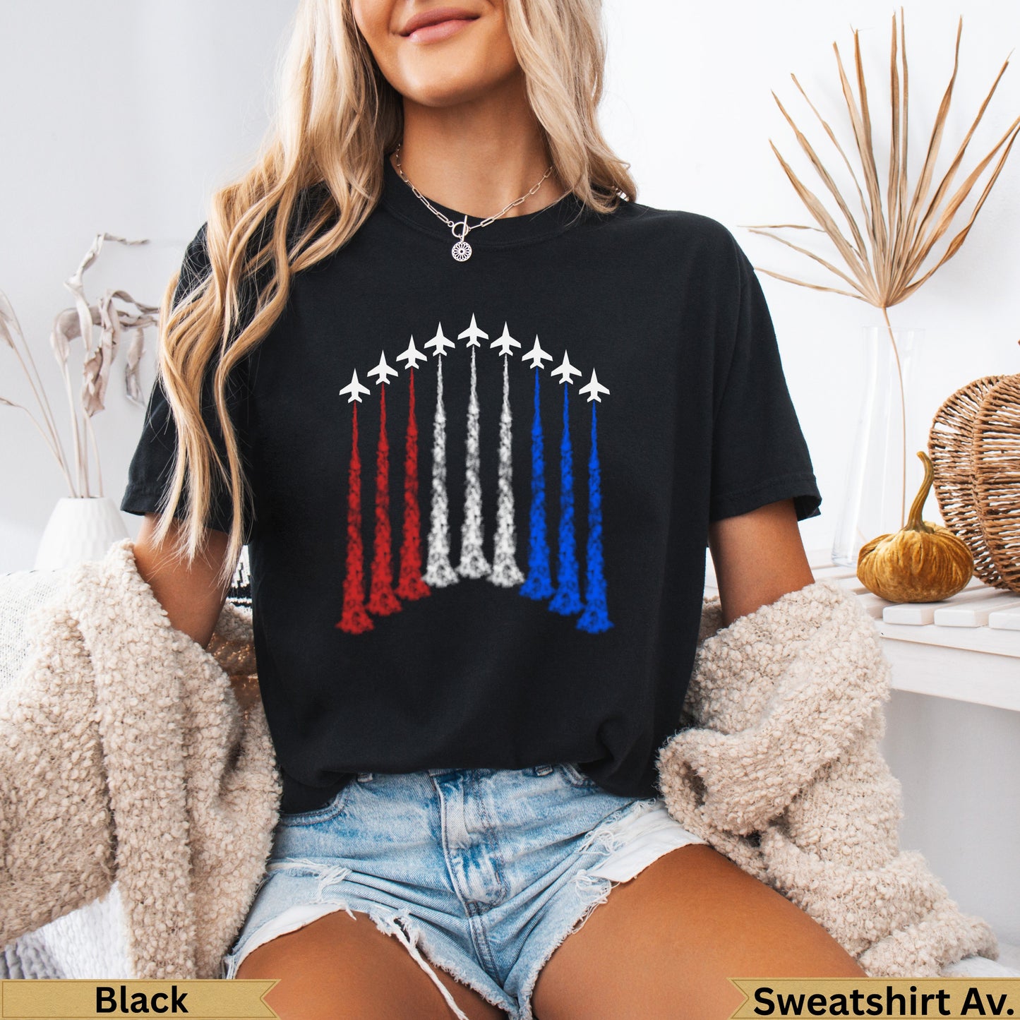 Black t-shirt with white jets flying red, white, and blue smoke trails.