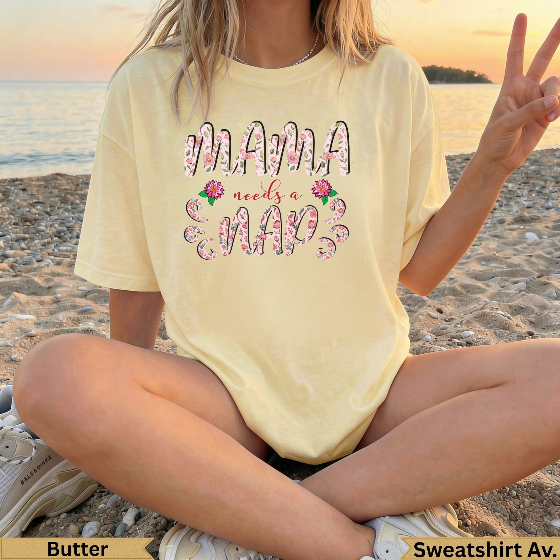 Yellow t-shirt with "Mama Needs a Mama" text and floral accents.