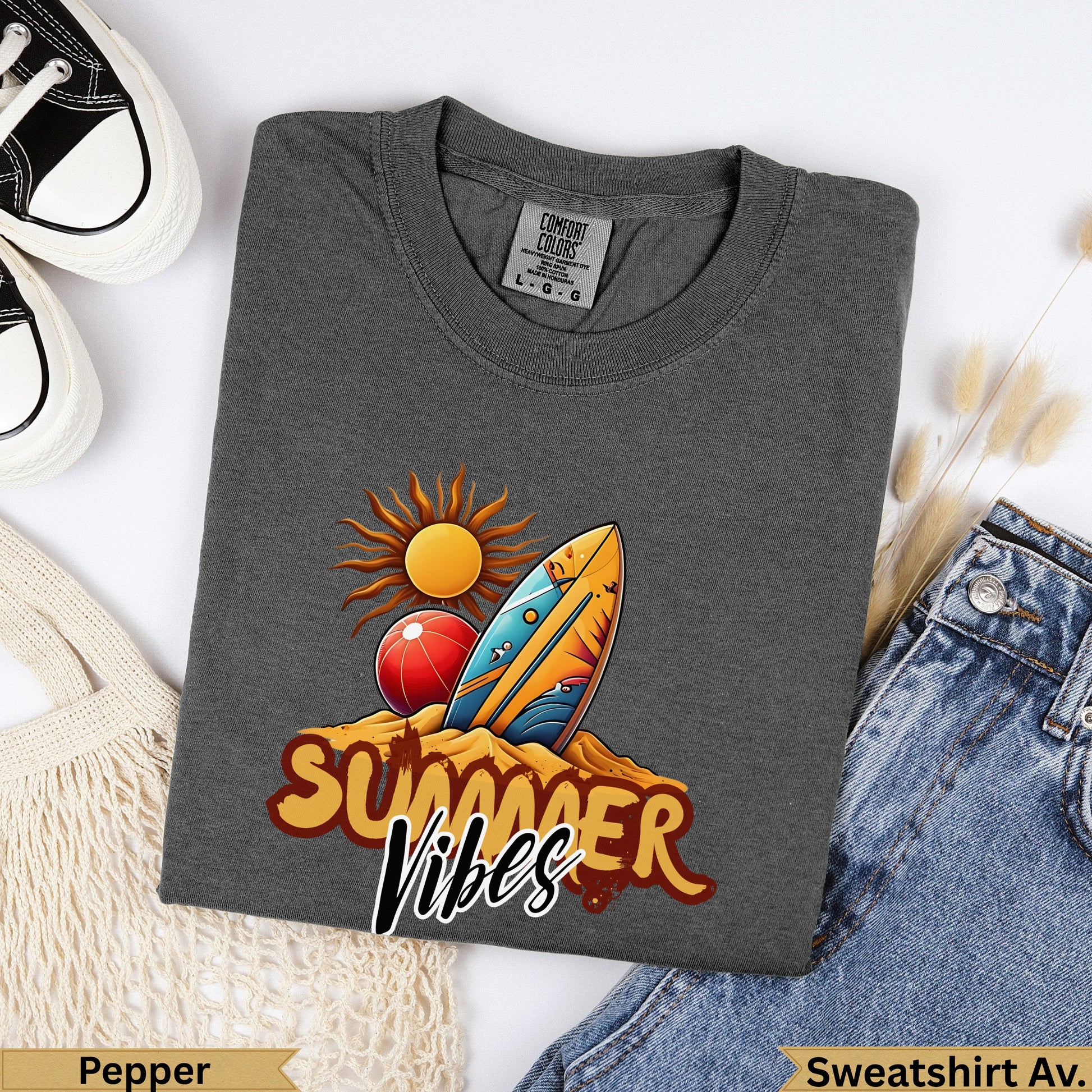 Dark gray sweatshirt with "Summer Vibes" graphic featuring a surfboard, beach ball, and sun.