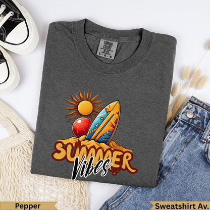 Dark gray sweatshirt with "Summer Vibes" graphic featuring a surfboard, beach ball, and sun.