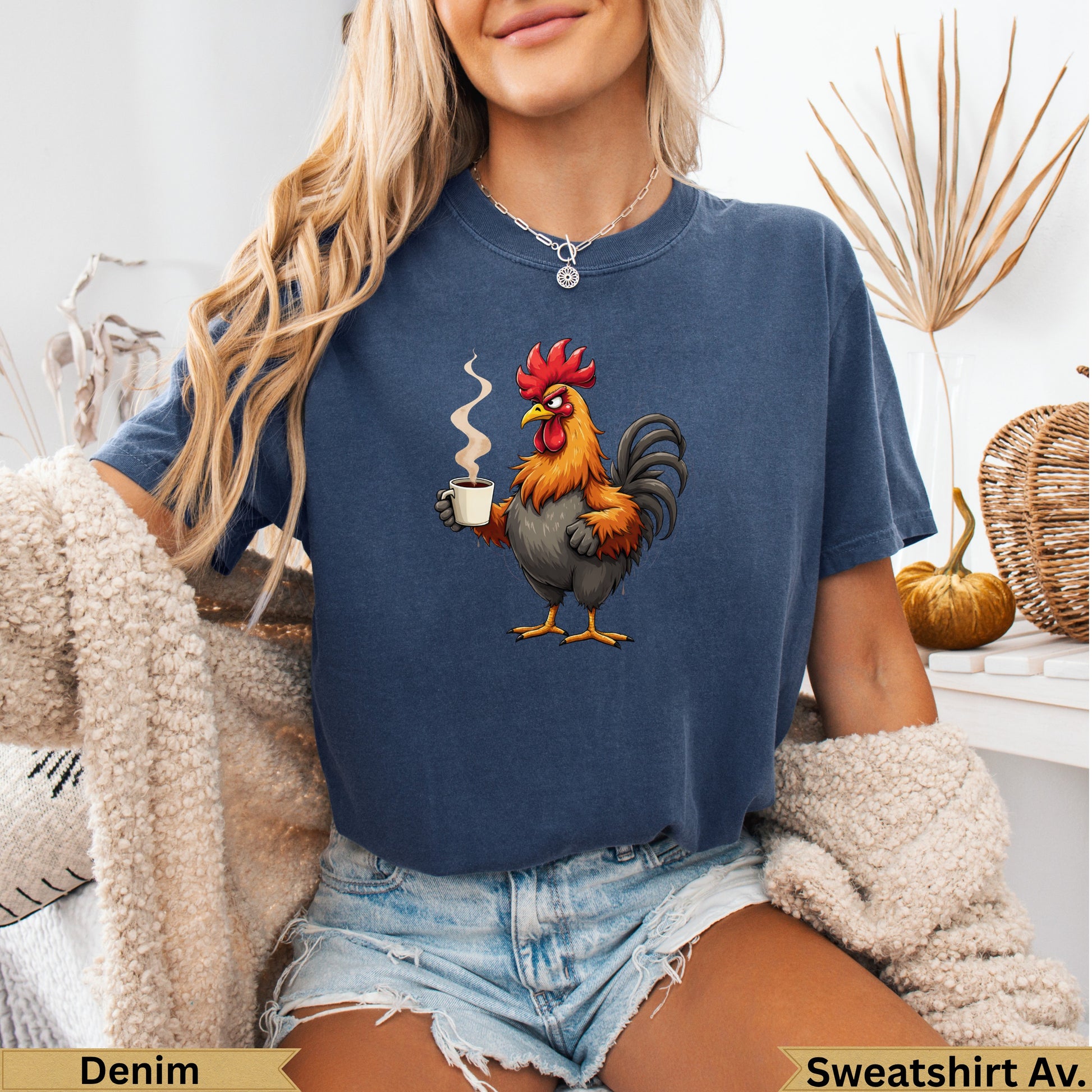 Rooster drinking coffee graphic on navy blue t-shirt.