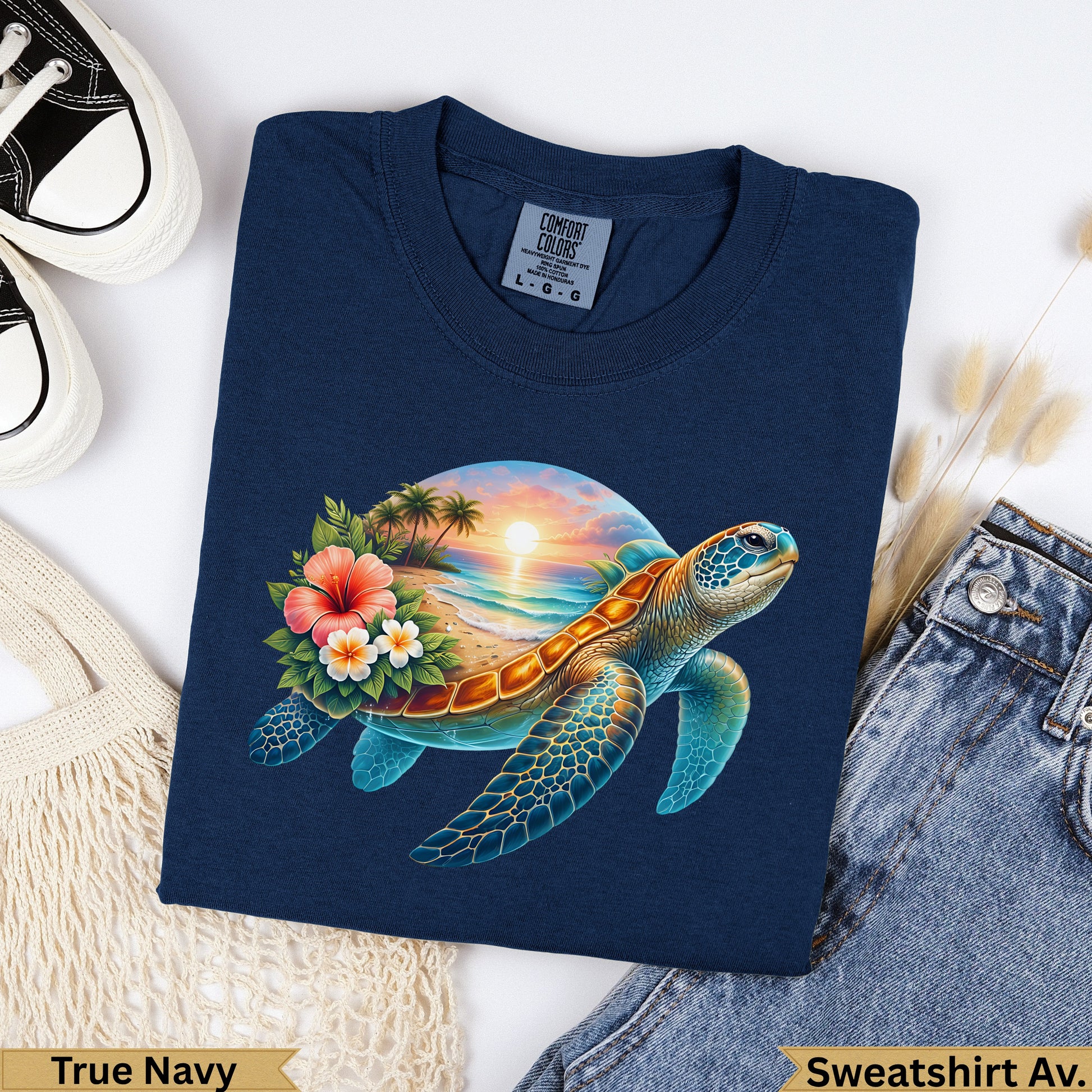 Navy sweatshirt with a sea turtle graphic and tropical beach sunset design.
