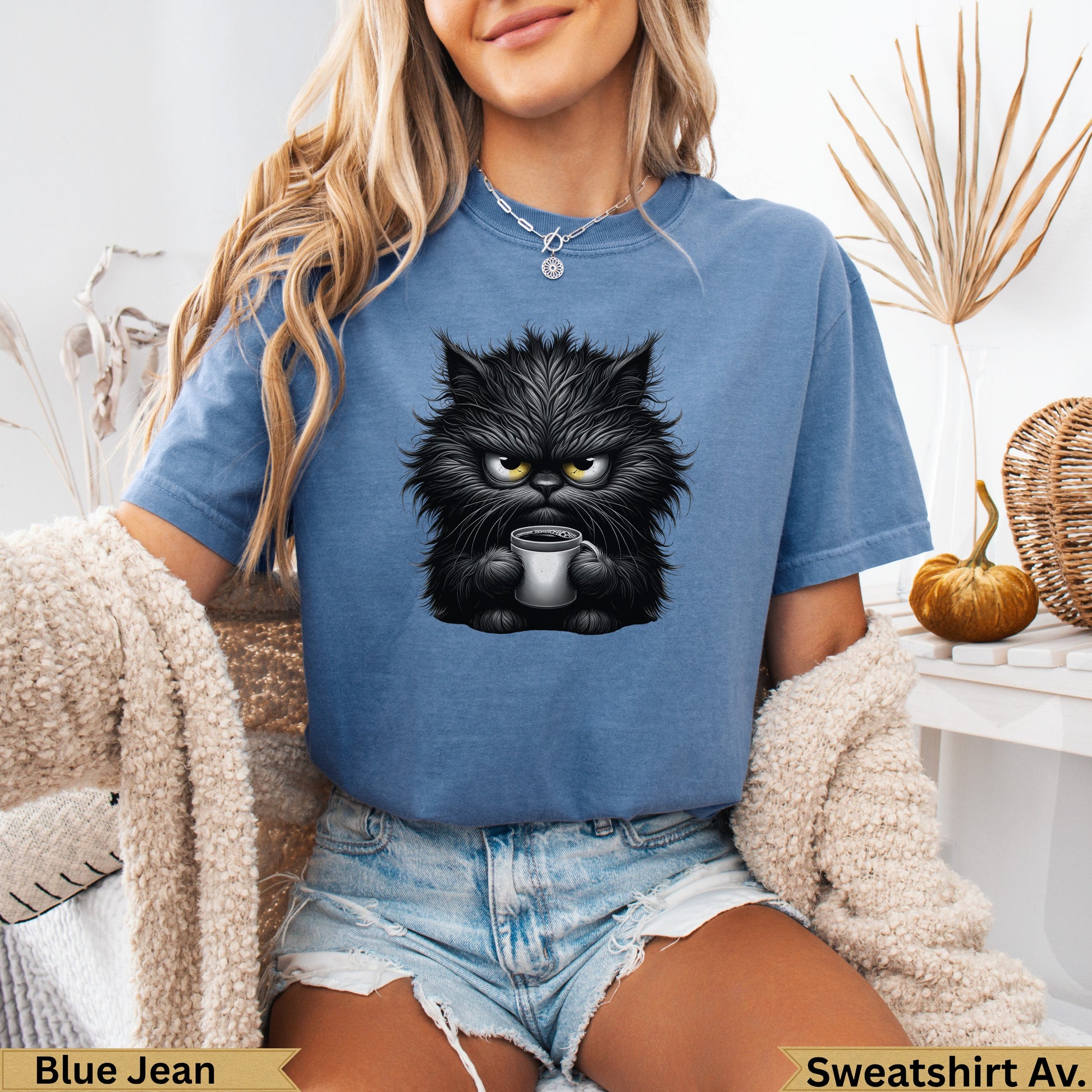 Blue Jean sweatshirt with grumpy black cat holding a coffee mug.