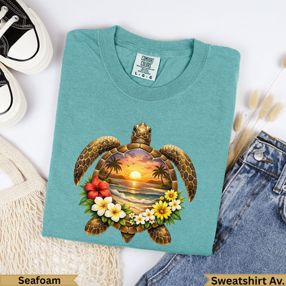 Teal Comfort Colors sweatshirt with a sea turtle graphic and tropical sunset scene.