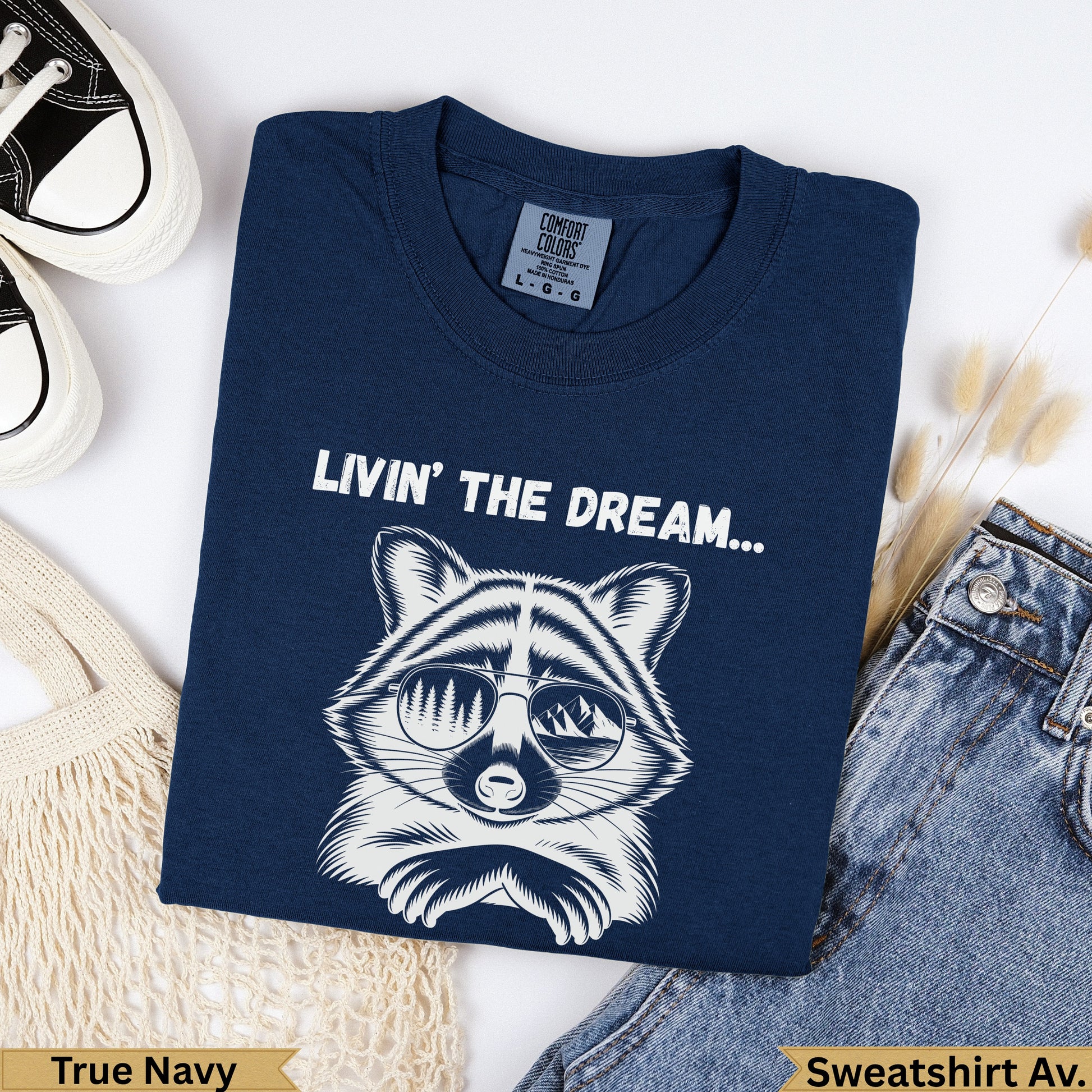 Navy t-shirt with raccoon wearing sunglasses, "Livin' the Dream..." text.