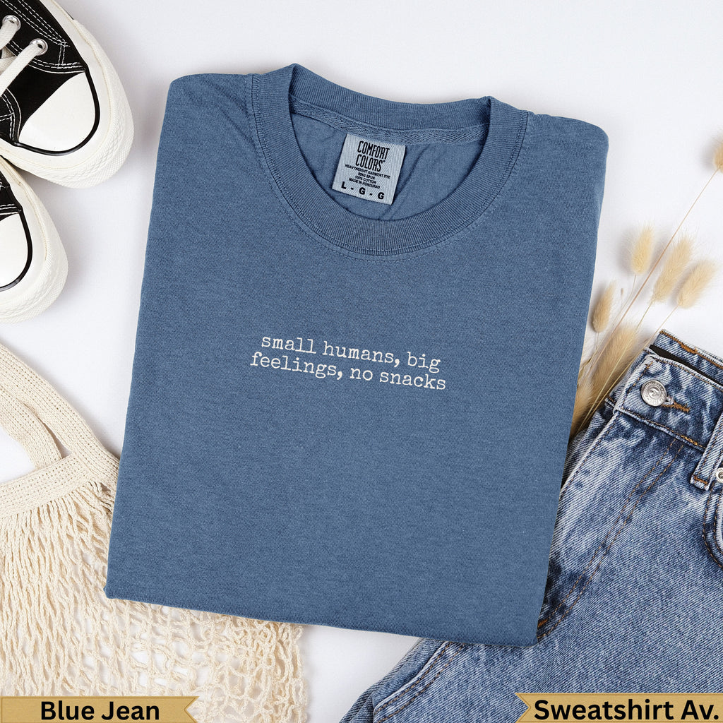 Blue Jean Comfort Colors sweatshirt with "small humans, big feelings, no snacks" text.