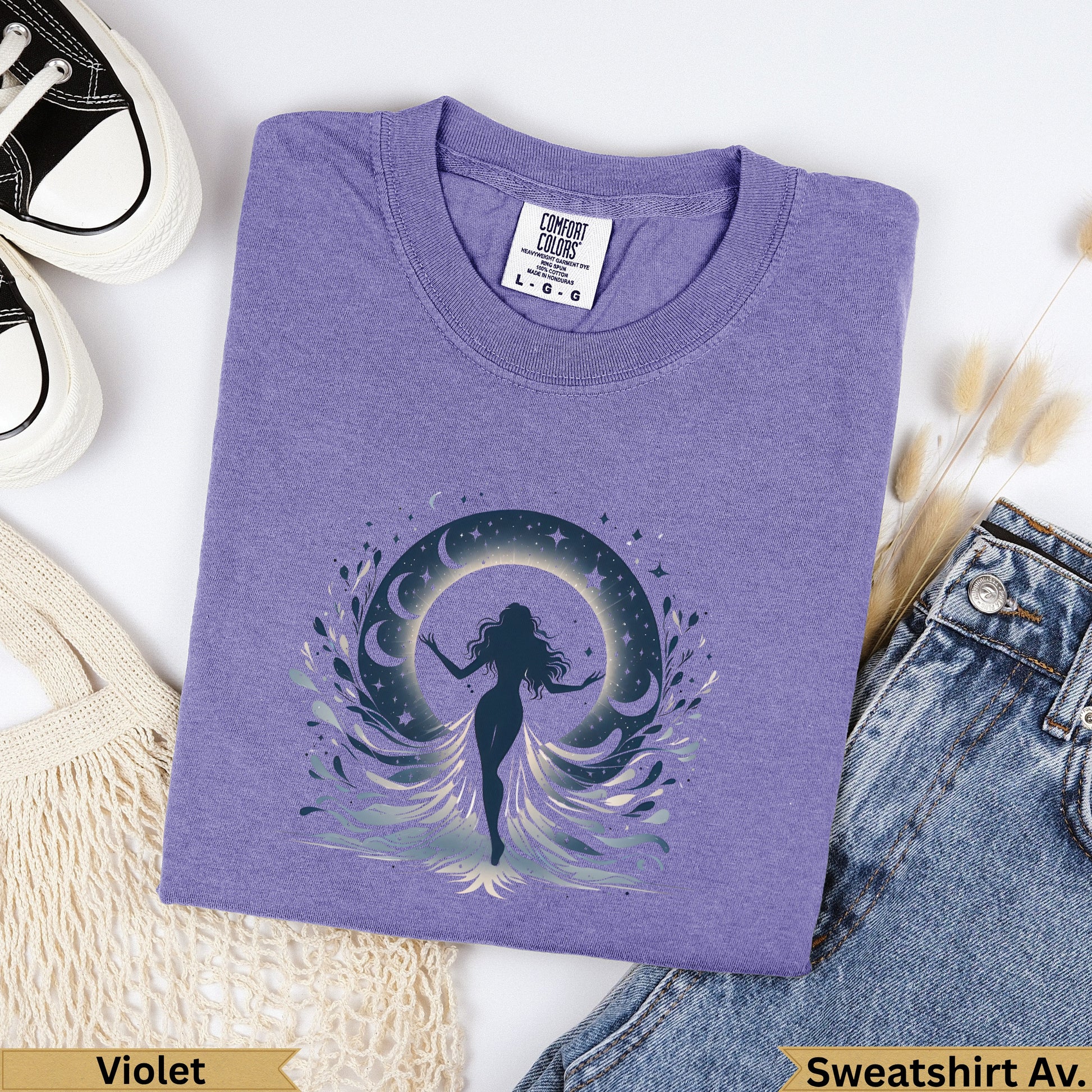 Purple t-shirt with celestial woman graphic and text "Violet Sweatshirt Av.".