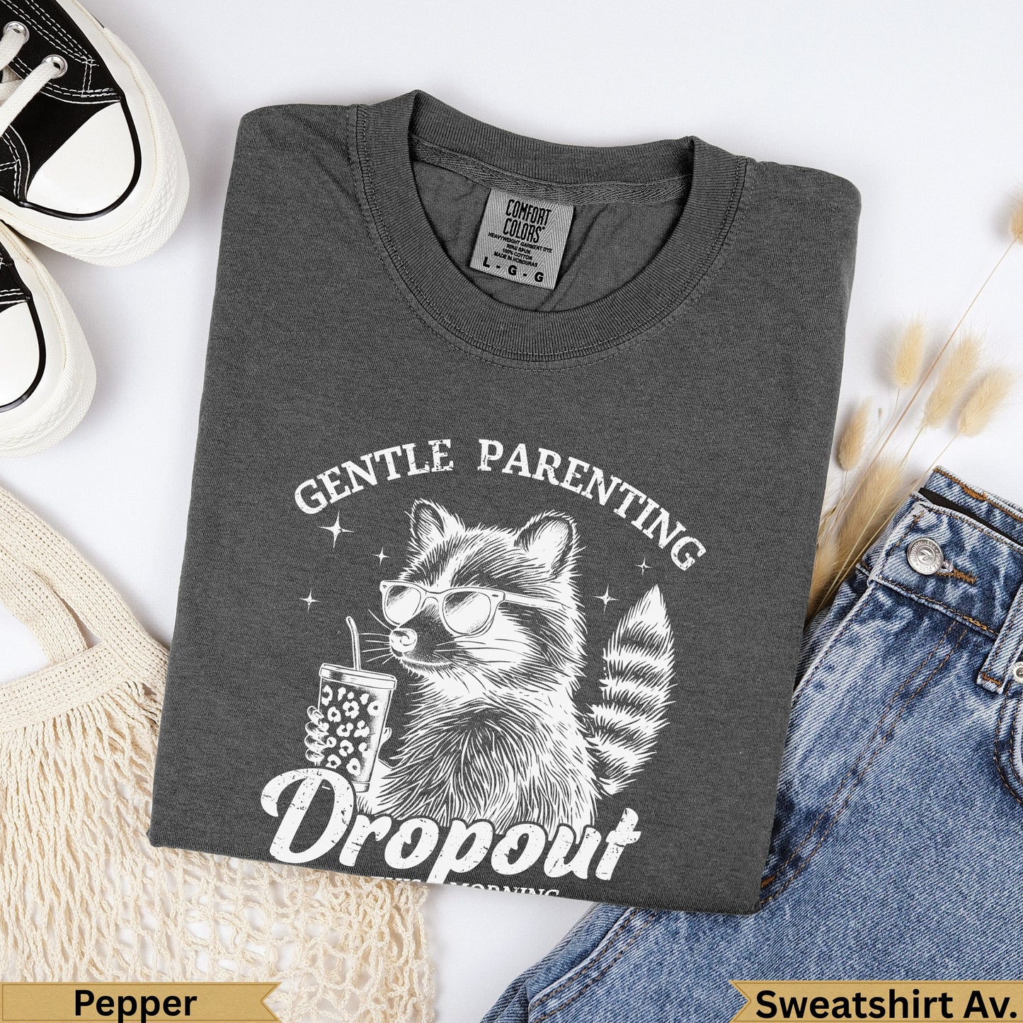 T-shirt with raccoon wearing sunglasses and drinking from a cup, "Gentle Parenting Dropout" text.