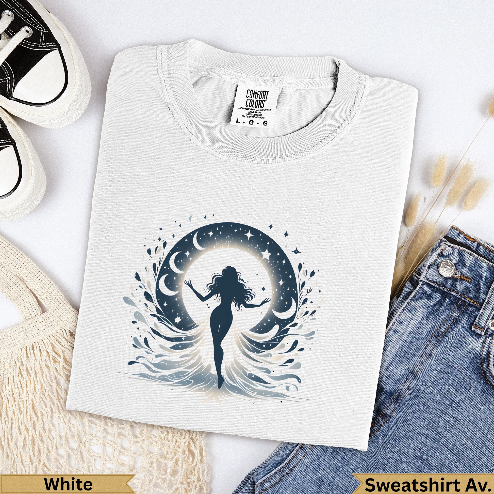 White Comfort Colors heavyweight garment-dyed sweatshirt with celestial woman graphic.