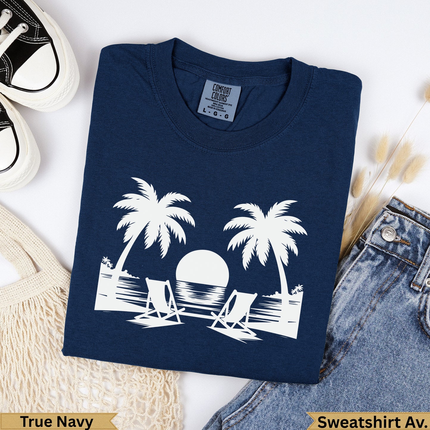 Navy blue Comfort Colors sweatshirt with palm trees, beach chairs, and ocean sunset graphic.