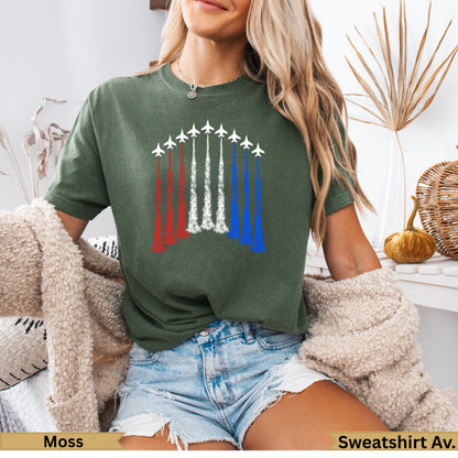 Green t-shirt with fighter jets leaving red, white, and blue smoke trails.