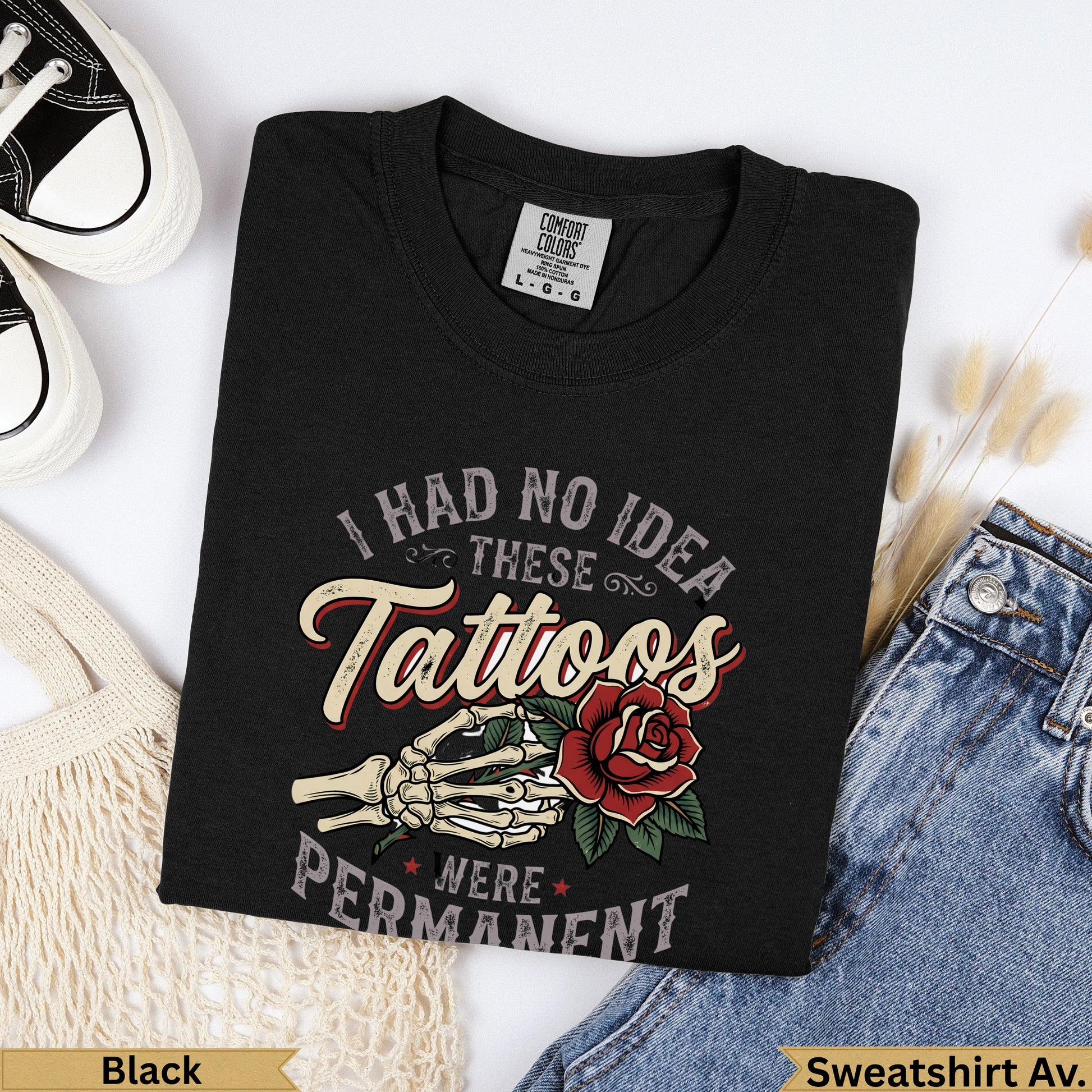 Black Comfort Colors t-shirt with "I Had No Idea These Tattoos Were Permanent" text and skeleton hand.