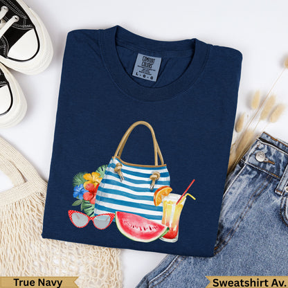 Navy blue graphic t-shirt with beach bag, watermelon, and sunglasses graphic.