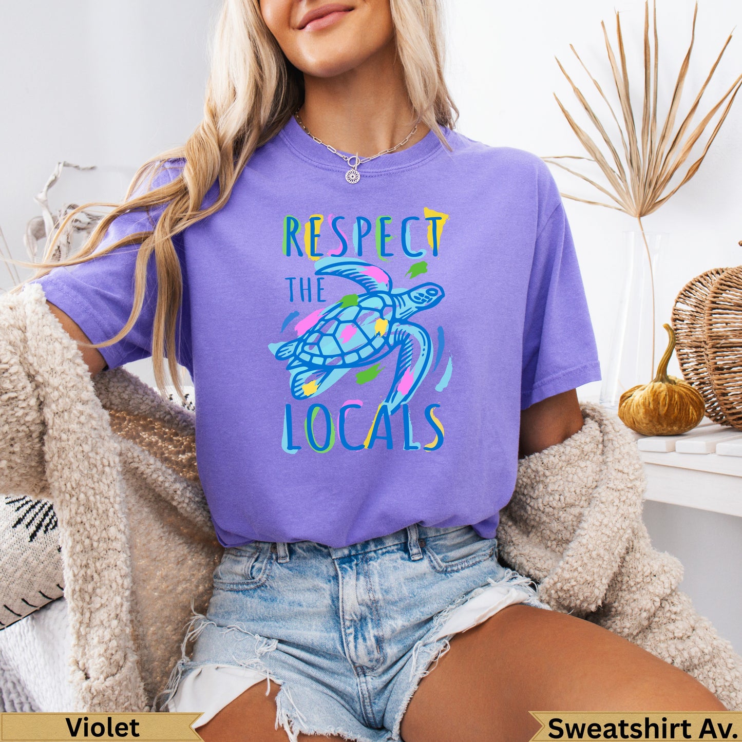 Purple t-shirt with a colorful sea turtle and "Respect the Locals" text.