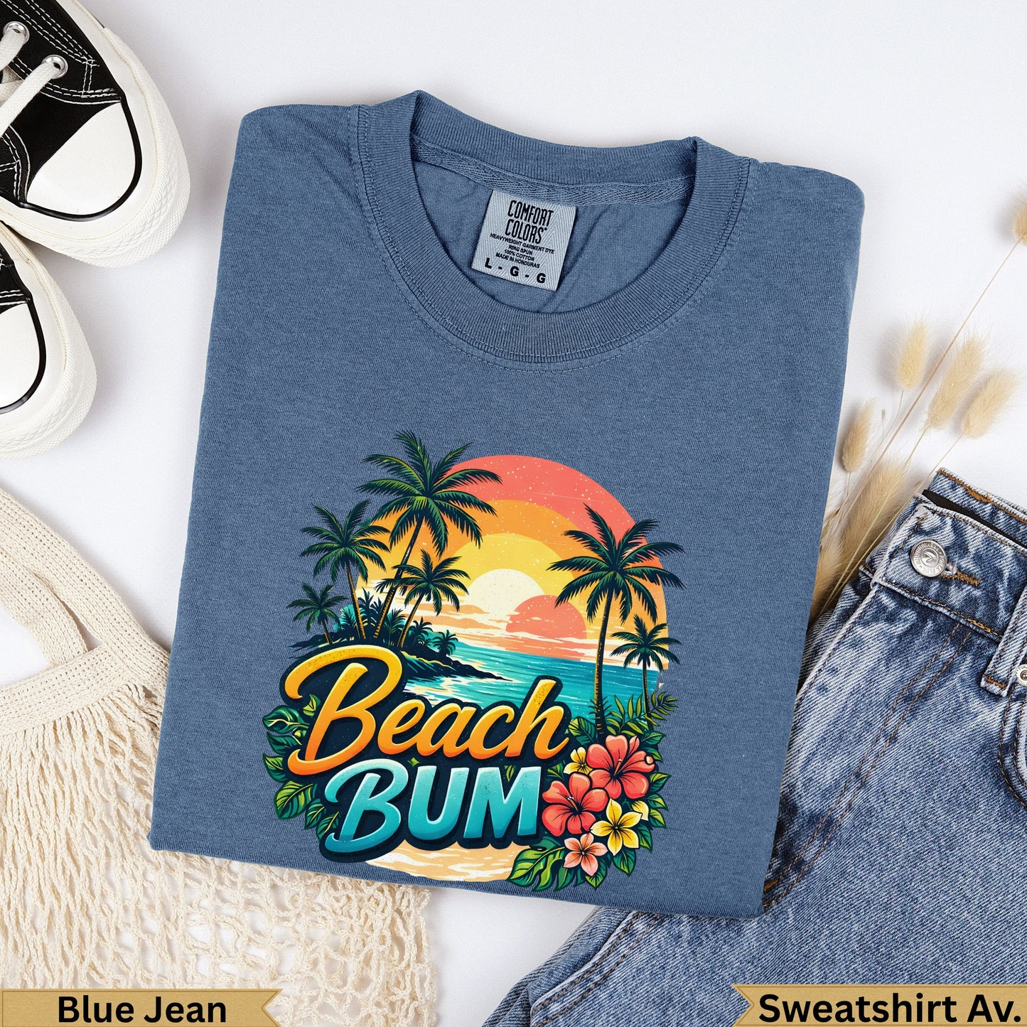 Blue Jean Comfort Colors sweatshirt with "Beach BUM" graphic and sunset.