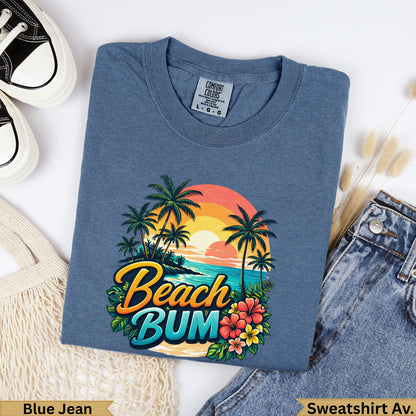 Blue Jean Comfort Colors sweatshirt with "Beach BUM" graphic and sunset.