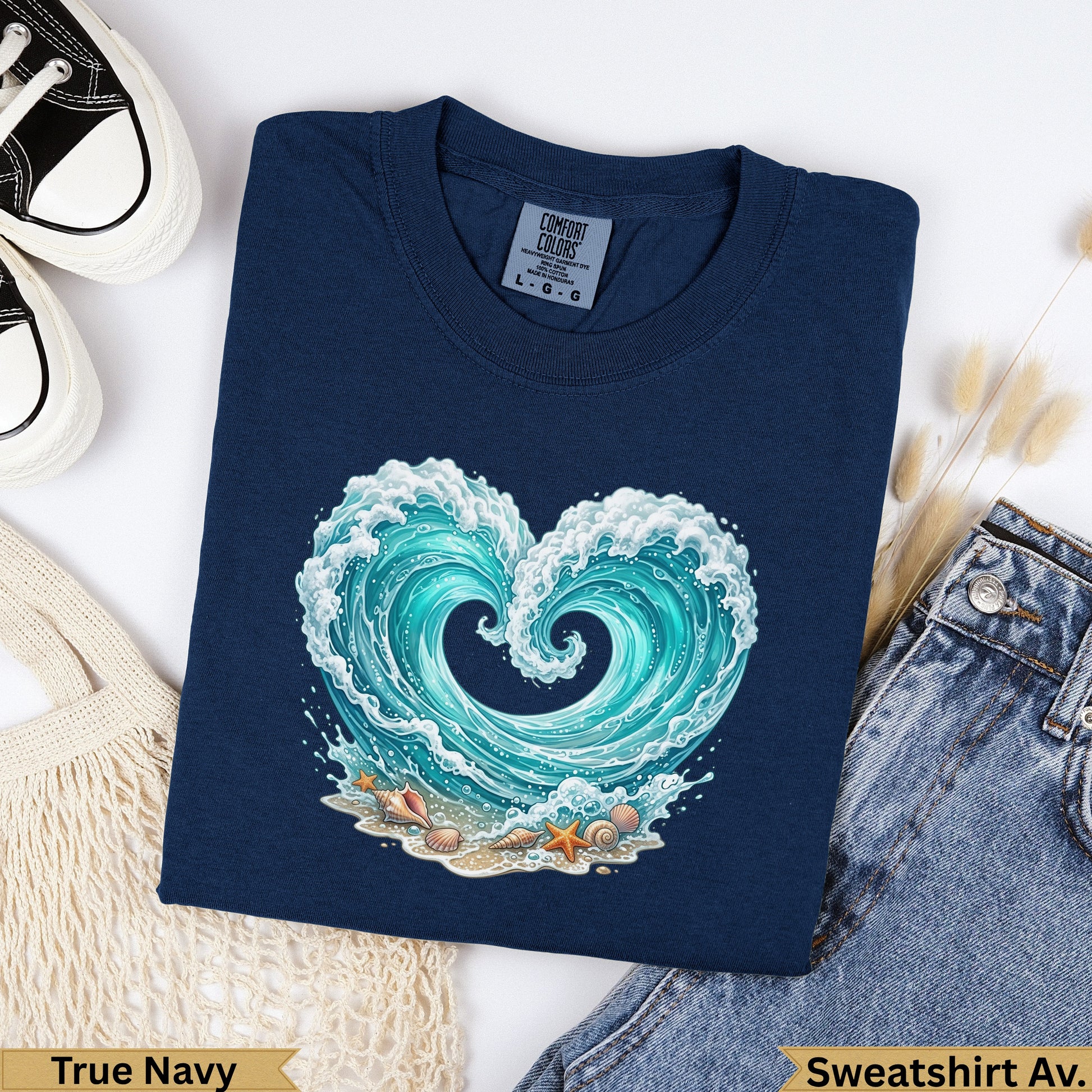 Navy blue sweatshirt with a heart-shaped wave design, shells, and starfish.