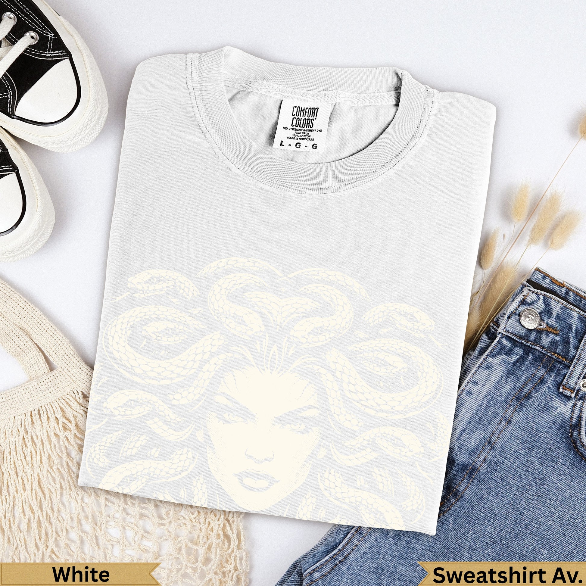 White Comfort Colors heavyweight garment-dyed t-shirt with Medusa graphic.