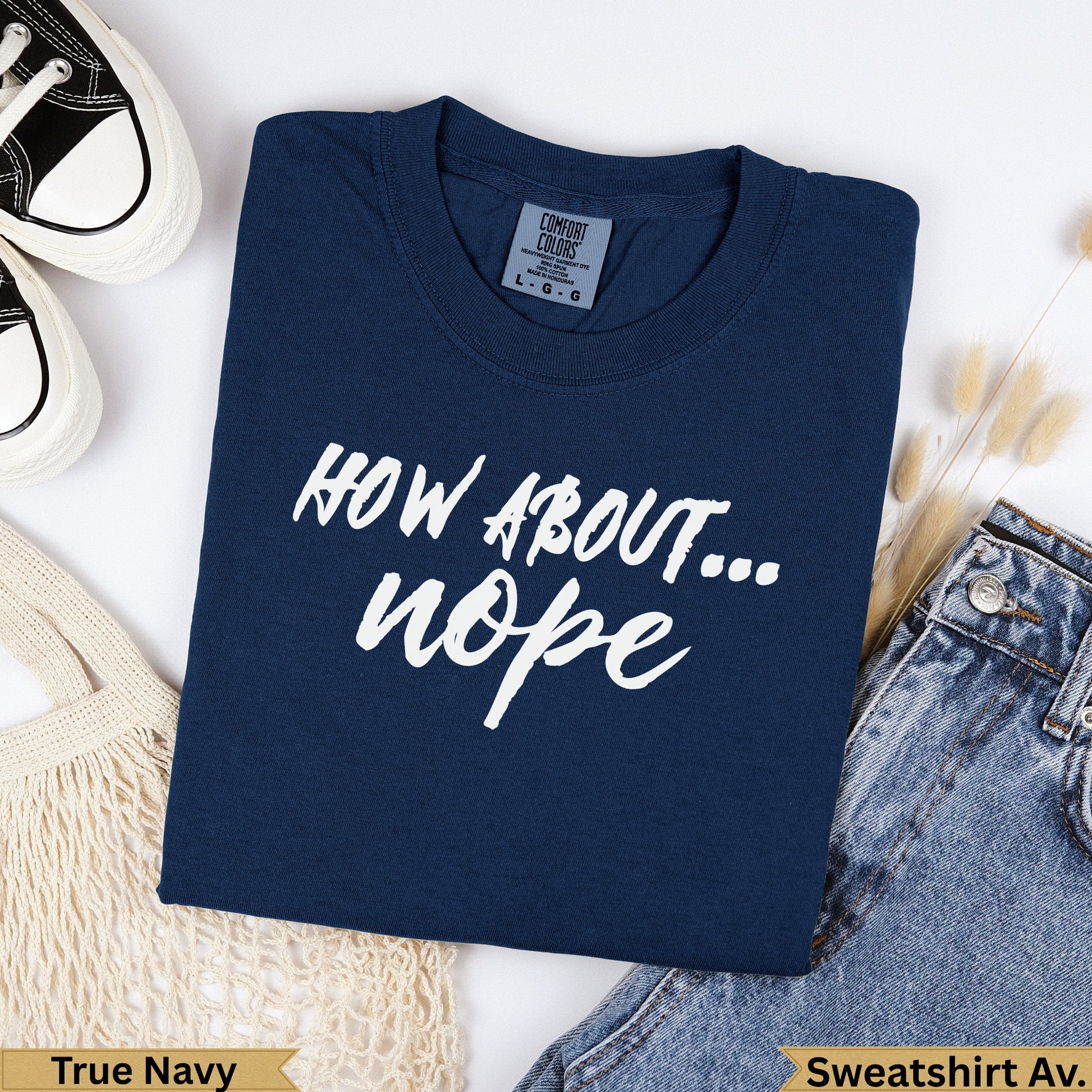 Navy t-shirt with "HOW ABOUT... nope" in white text.