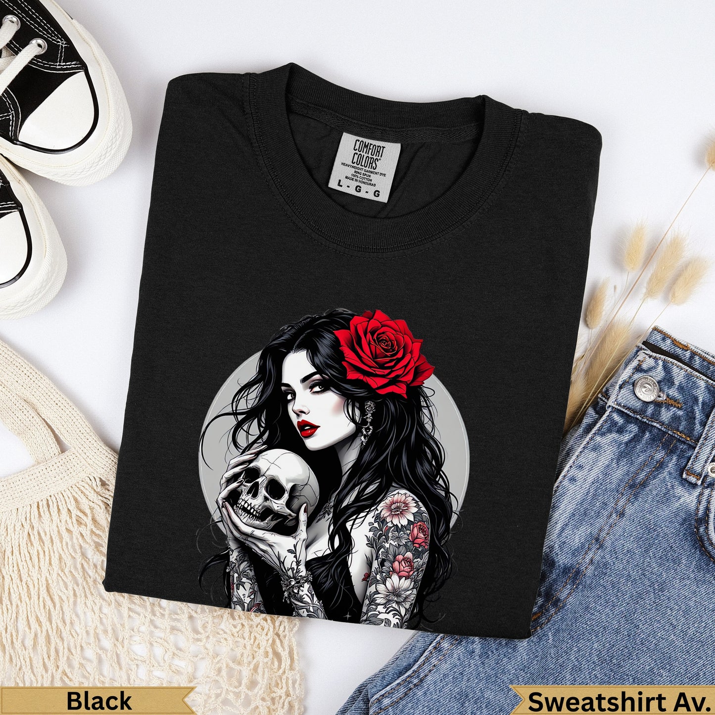 Black sweatshirt with graphic of woman holding a skull and red rose.