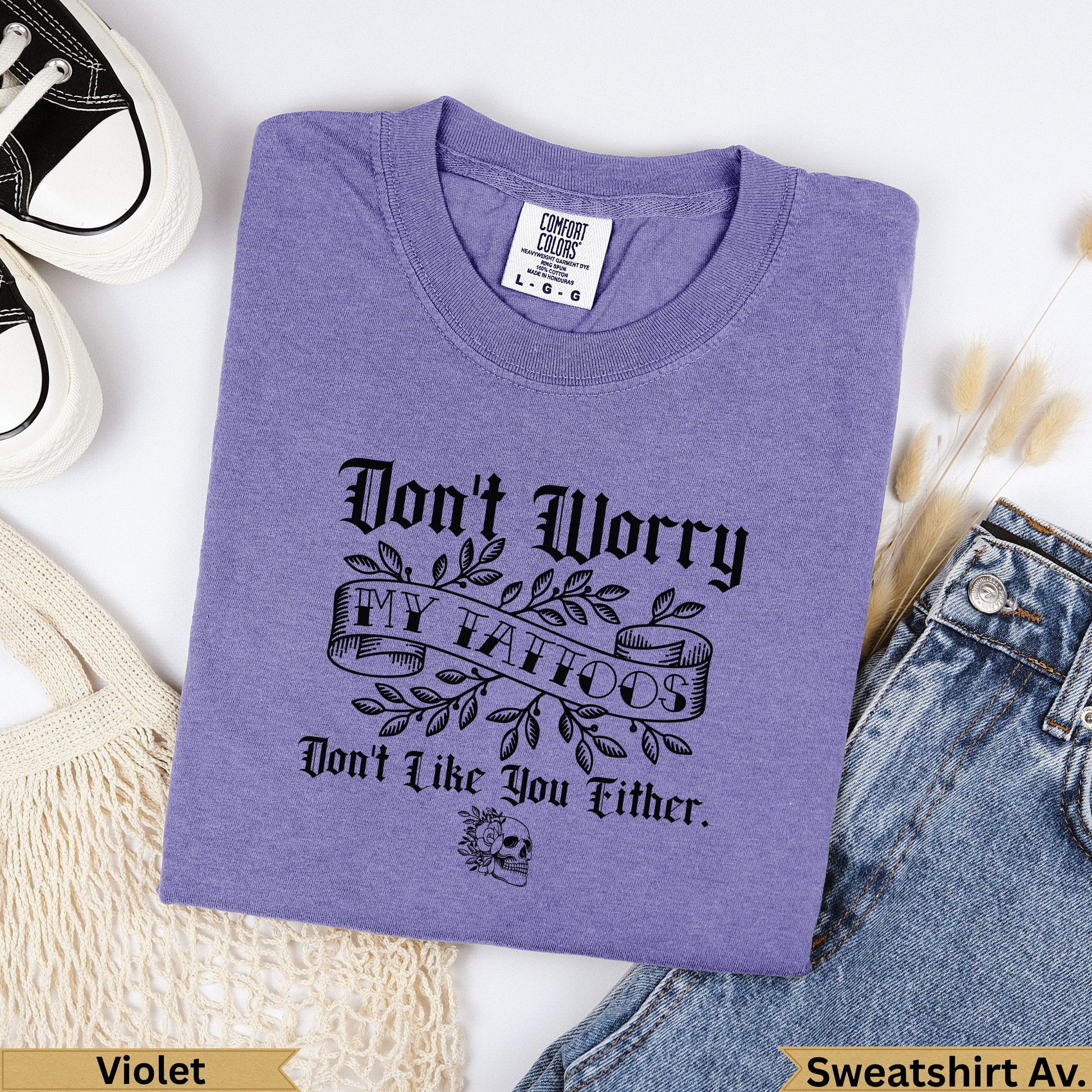 Purple Comfort Colors sweatshirt with "Don't Worry My Tattoos Don't Like You Either" text.