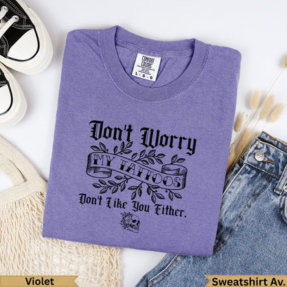 Purple Comfort Colors sweatshirt with "Don't Worry My Tattoos Don't Like You Either" text.