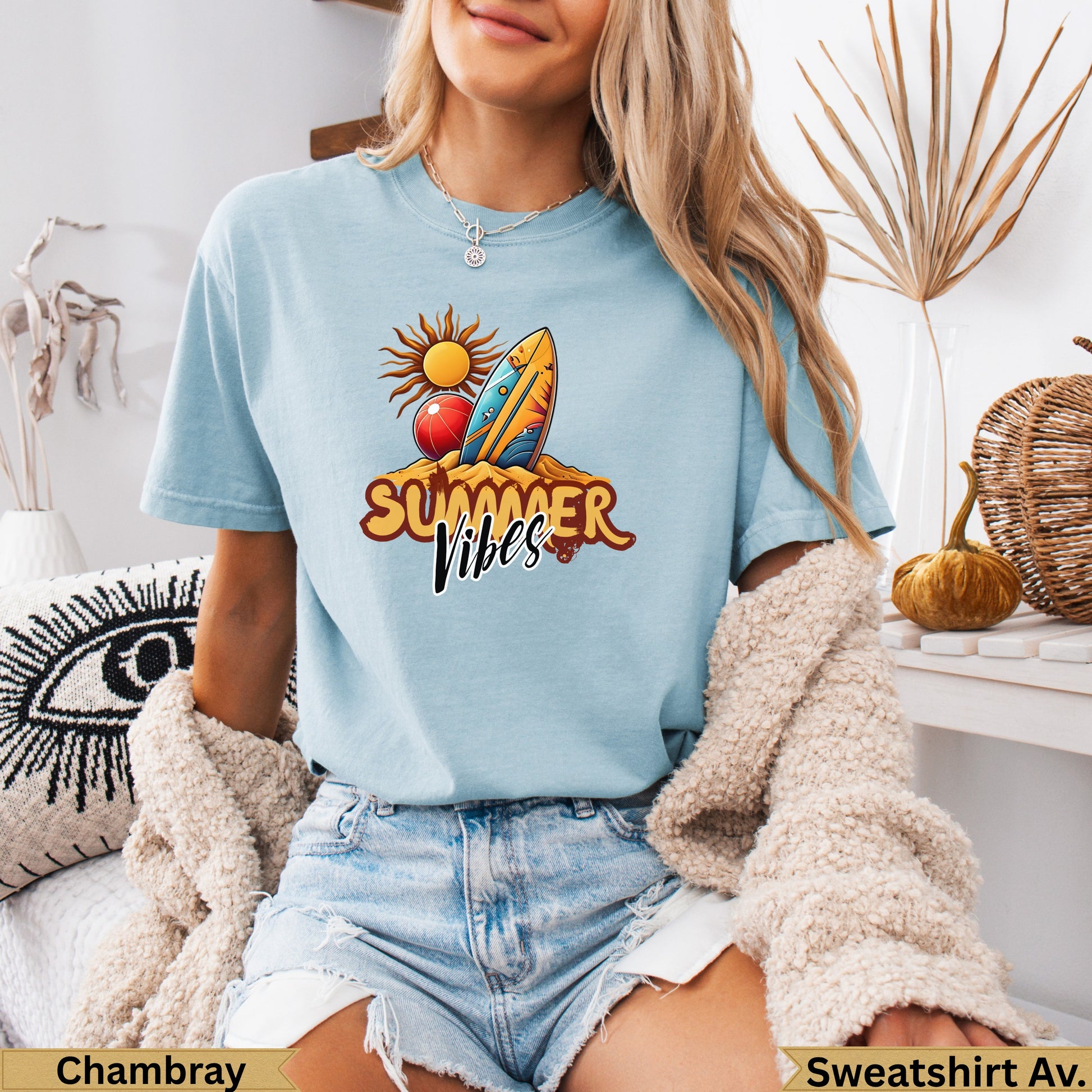 Light blue t-shirt with "Summer Vibes" graphic and beach elements.