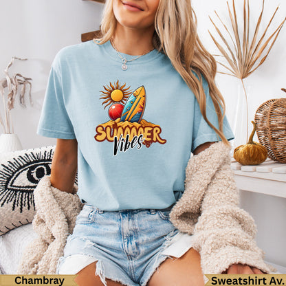 Light blue t-shirt with "Summer Vibes" graphic and beach elements.