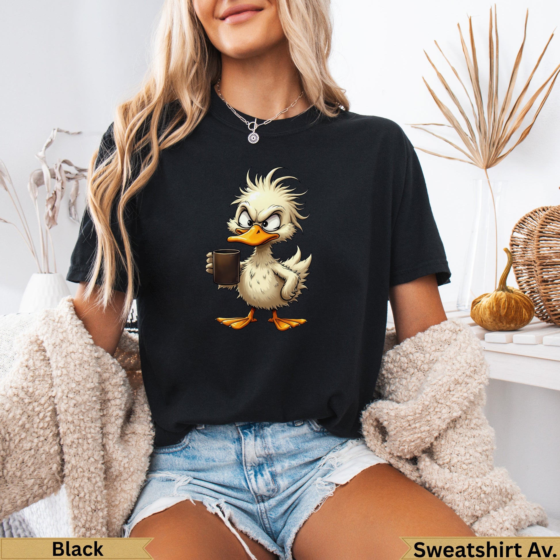 Cartoon duck wearing a necklace holding a coffee cup.